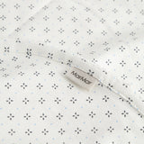 White baby blanket with fine pattern