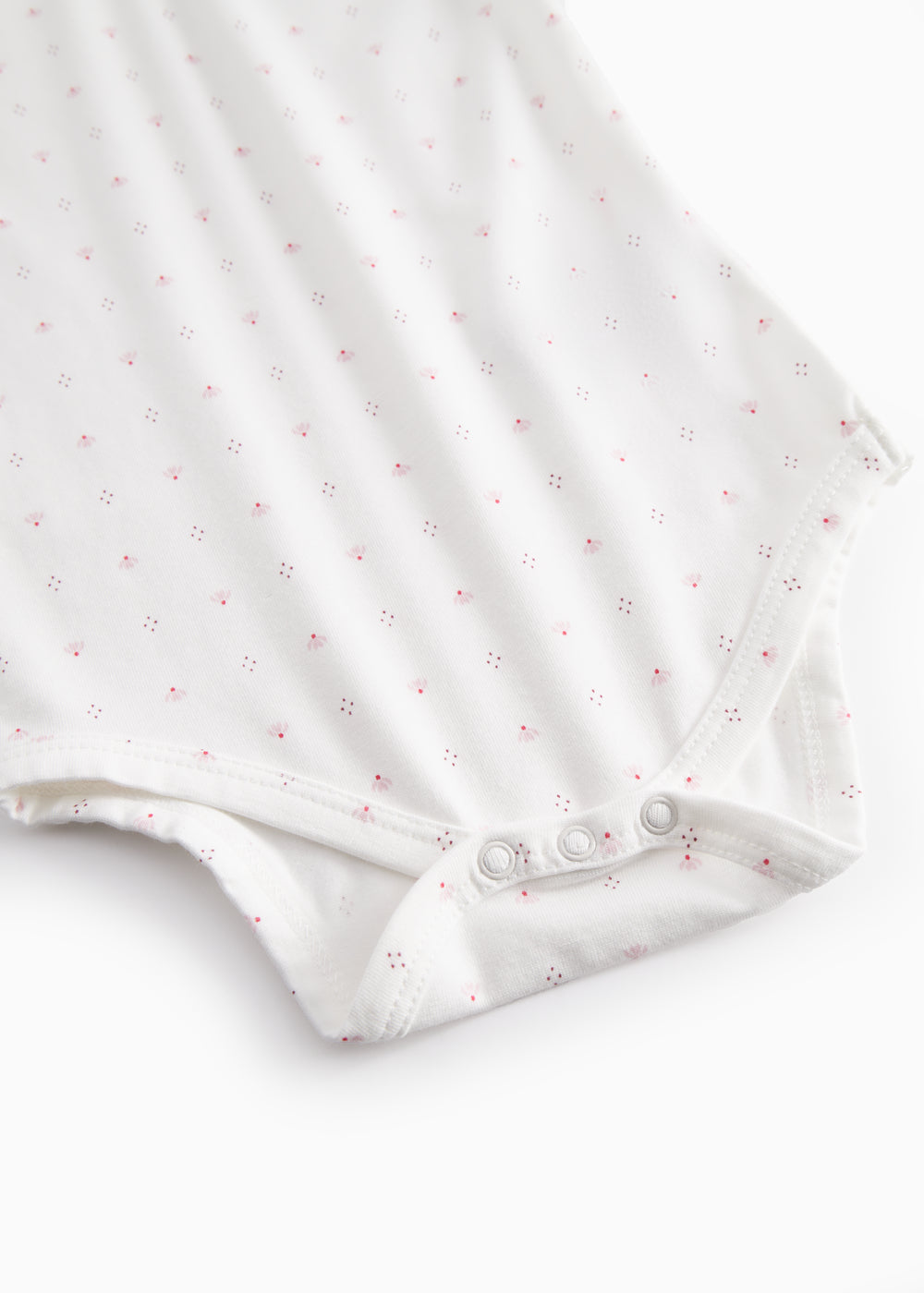 White short-sleeved baby bodysuit with small flowers