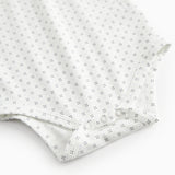 White short-sleeved baby bodysuit with fine pattern