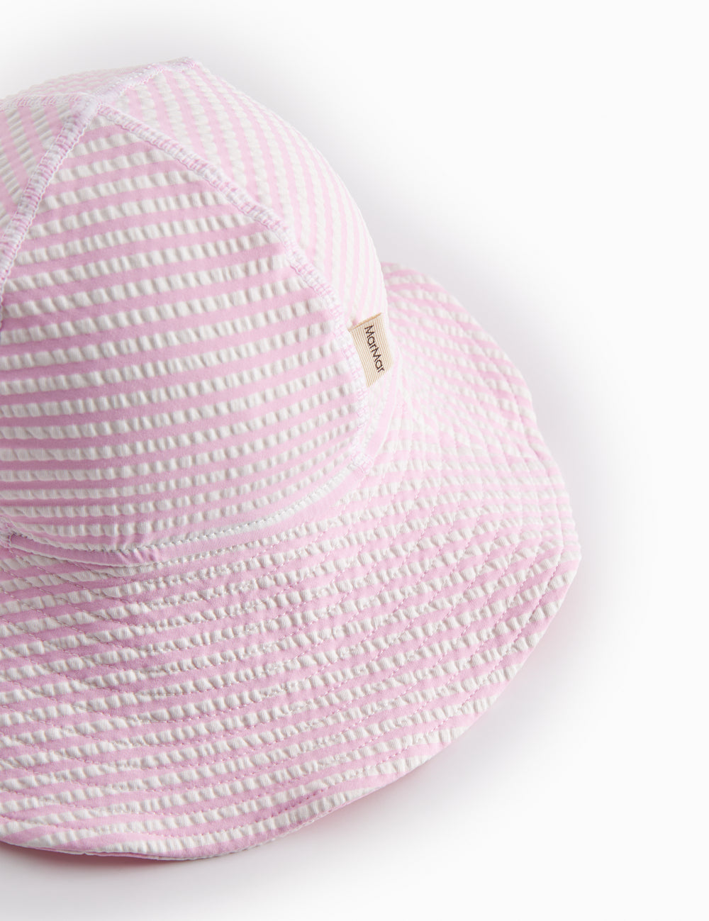 Badehat til baby og børn med et stripet mønster