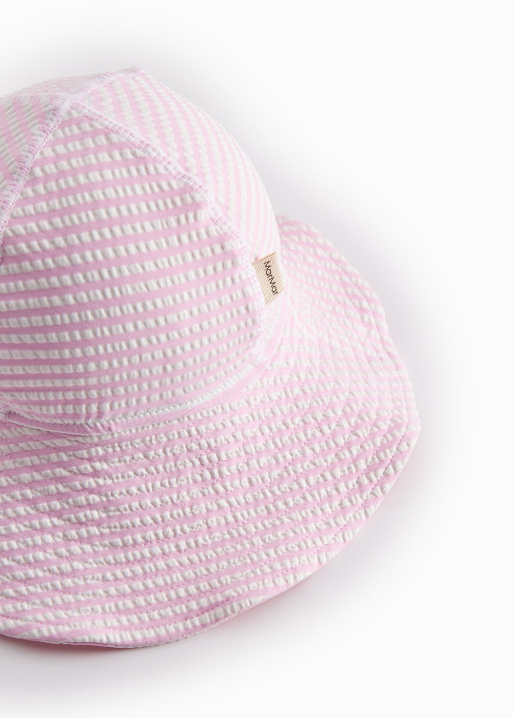 Badehat til baby og børn med et stripet mønster