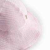 Badehat til baby og børn med et stripet mønster