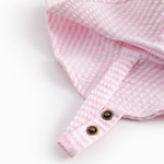 Badehat til baby og børn med et stripet mønster