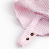 Badehat til baby og børn med et stripet mønster