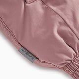 Pink jumpsuit with elastic leg edge and MARmAR label on seam.