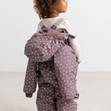 Lil suit with hood and small flower print, zipper and adjustable waist.