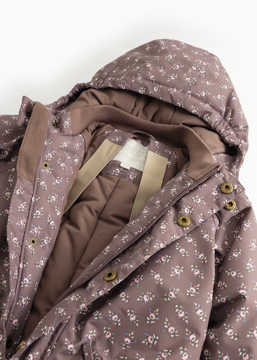Hooded jumpsuit with zipper and small floral print in dark brown.