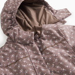 Winter jacket with hood and visible front in dark brown; floral print all over.