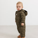 Dark green faux fur jumpsuit with hood, zipper, and quilted pattern