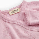 Pink bodystocking with lace pattern, ribbed collar, and visible brand label.
