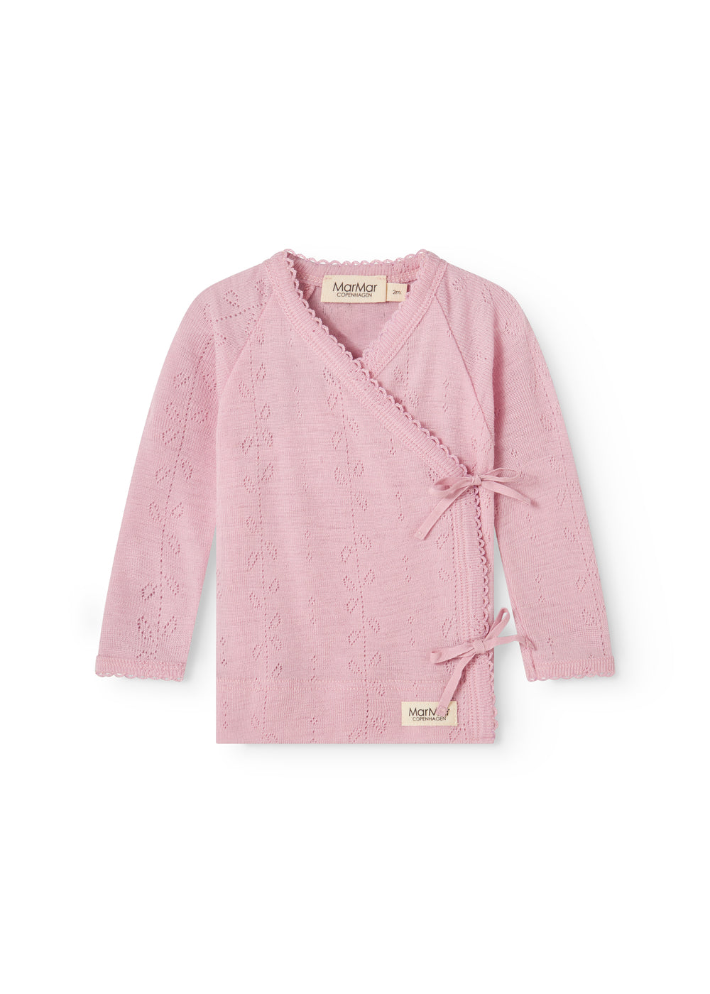 Pink cover blouse with long sleeves and cross closure in front.