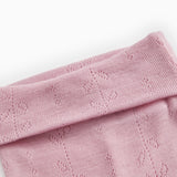 Kids' trousers in soft berry-pink with a wide ribbed edge at the top and a hollow-patterned knit.