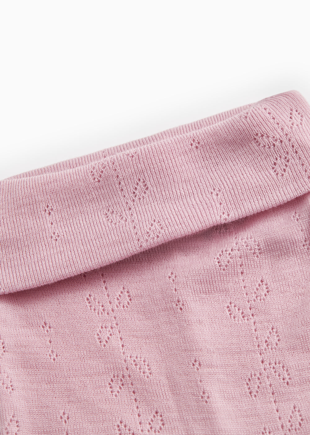 Baby tights in soft berry with ribbed lining and floral jacquard pattern