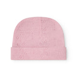 Aiko pink striped hat with solid top and patterned cuff.