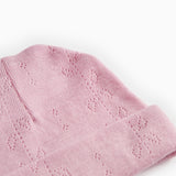 Pink striped hat with cut-out pattern and folded cuff