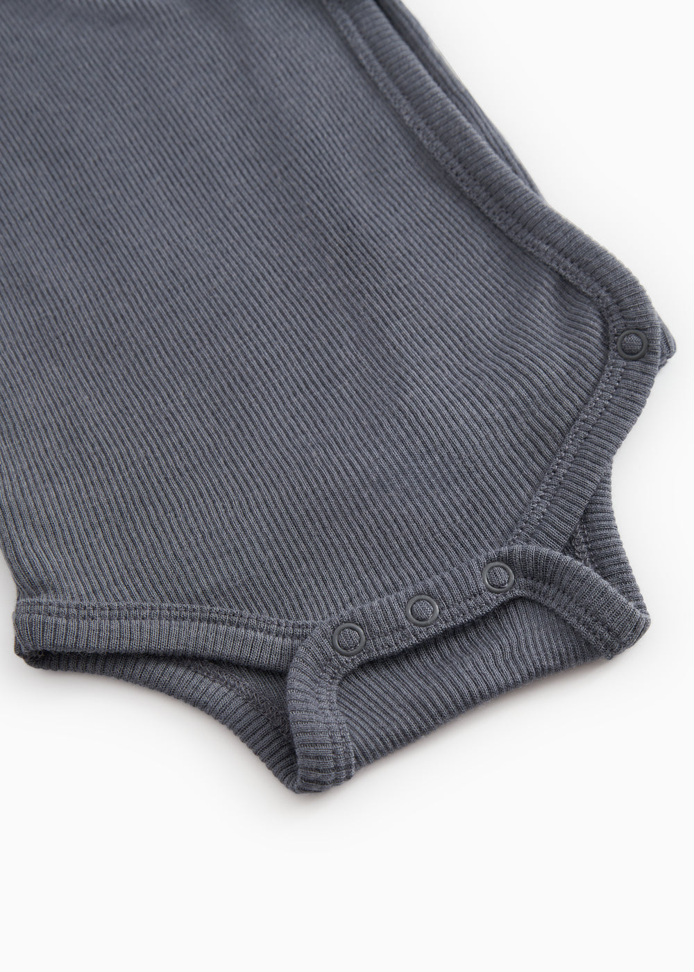 Dark blue-gray ribbed bodystocking with snap buttons in the crotch.