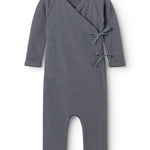 Rula held a dark gray rib dress with long sleeves and a knot band at the chest.