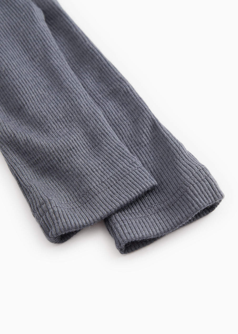 Ribbed cuff on dark gray pants from Piva