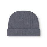 Dark gray ribbed baby hat with pom-pom and central fold.
