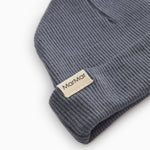 Dark gray ribbed baby hat with MarMar label in the front.