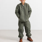 Odin boots in dark green with elastic waist and cuffs.
