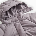 Pink down jacket with zipper and visible inner lining, plus a push button.