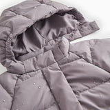 Pink down jacket with zipper and visible inner lining, plus a push button.