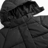 Warm jacket with hood and front closure in a tight, quilted pattern.