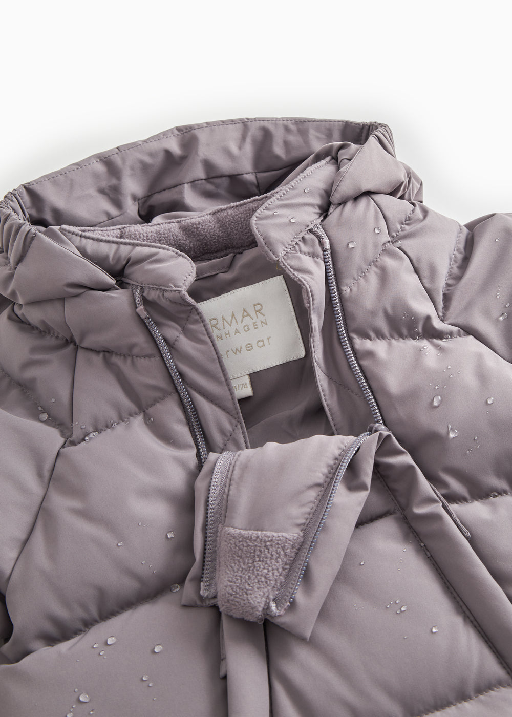 Light down jacket shell on overall with zipper and logo label.