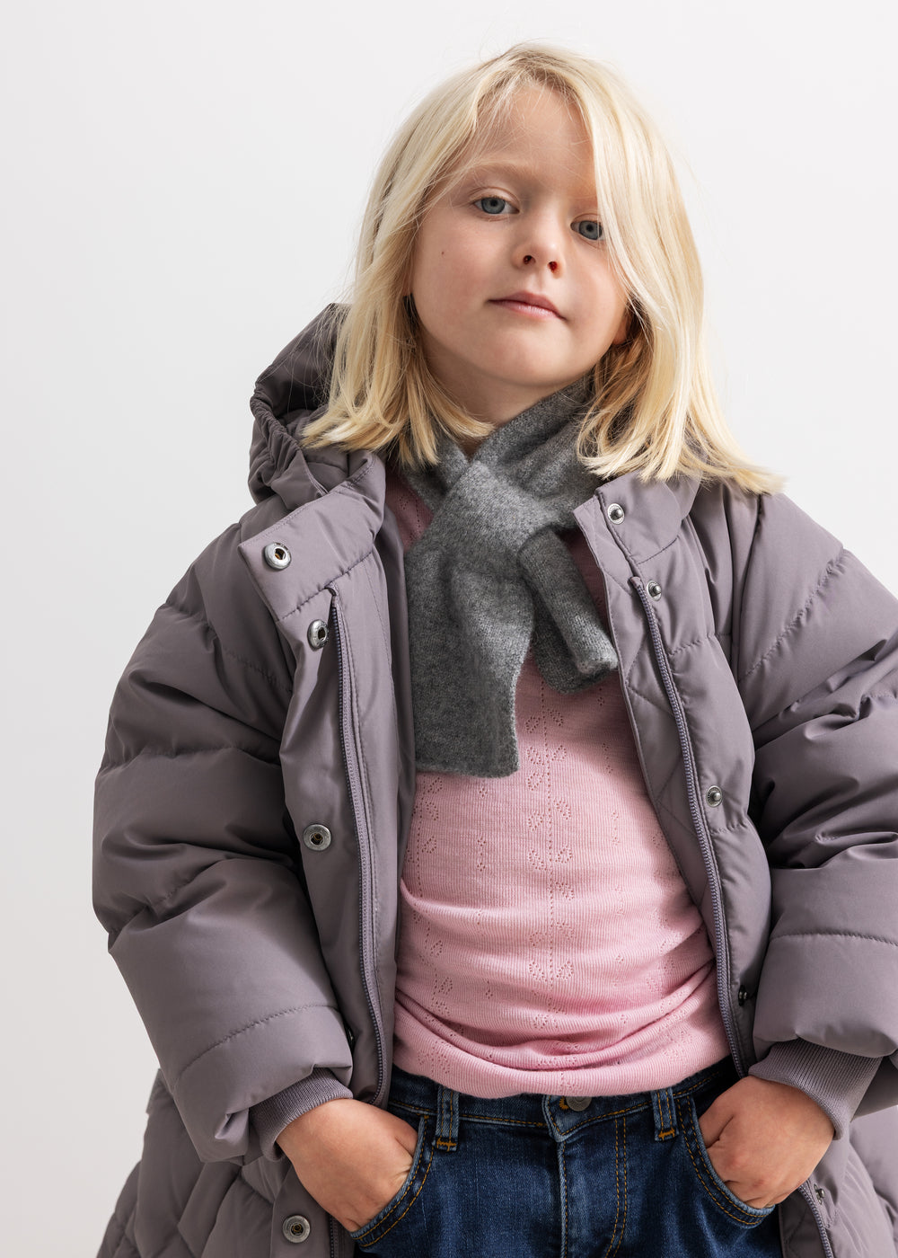 Oxford trench coat with hood, dark plum, snap closure and gray lining.