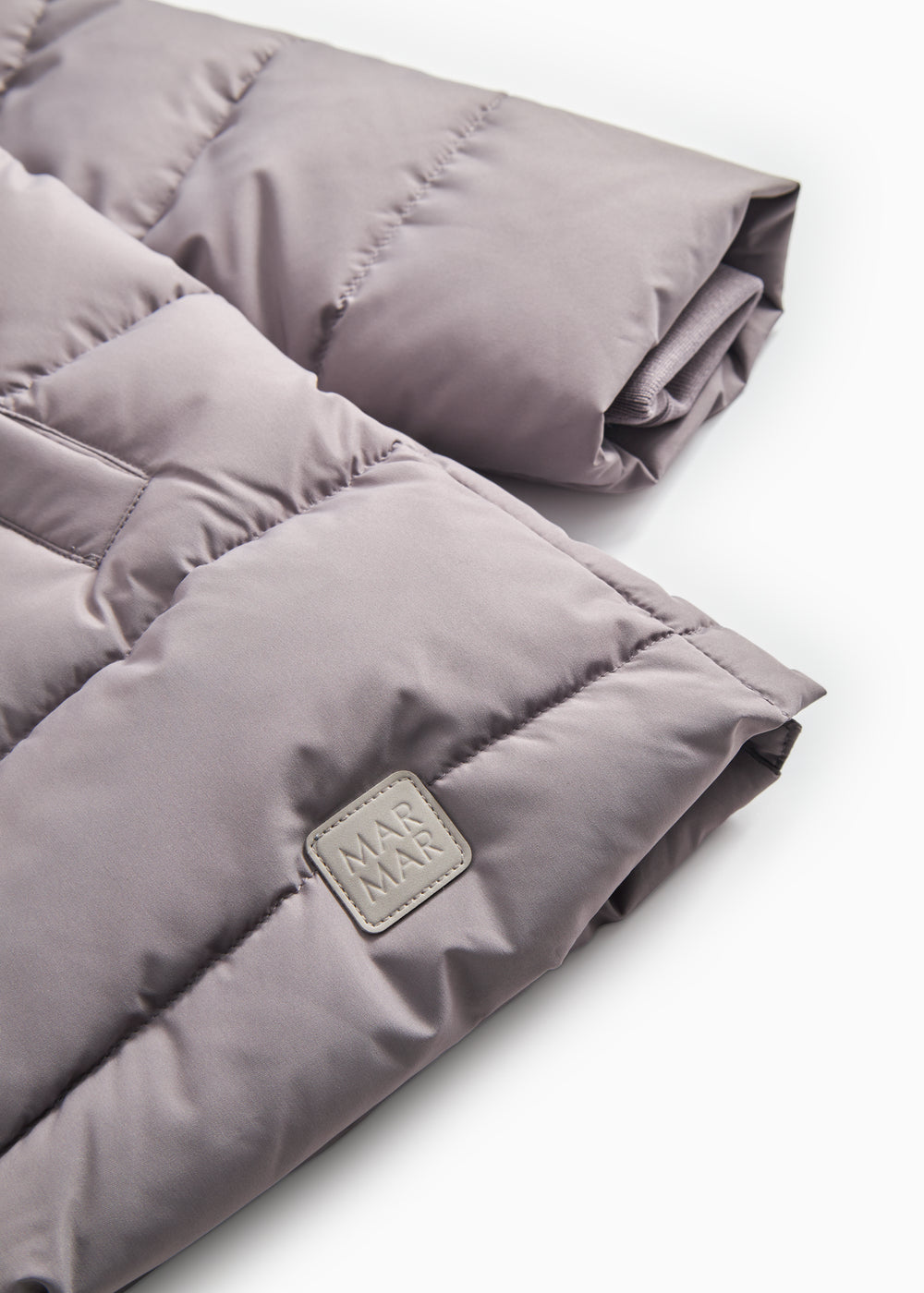 Dunfrakke jacket with brand label and quilted, padded edges