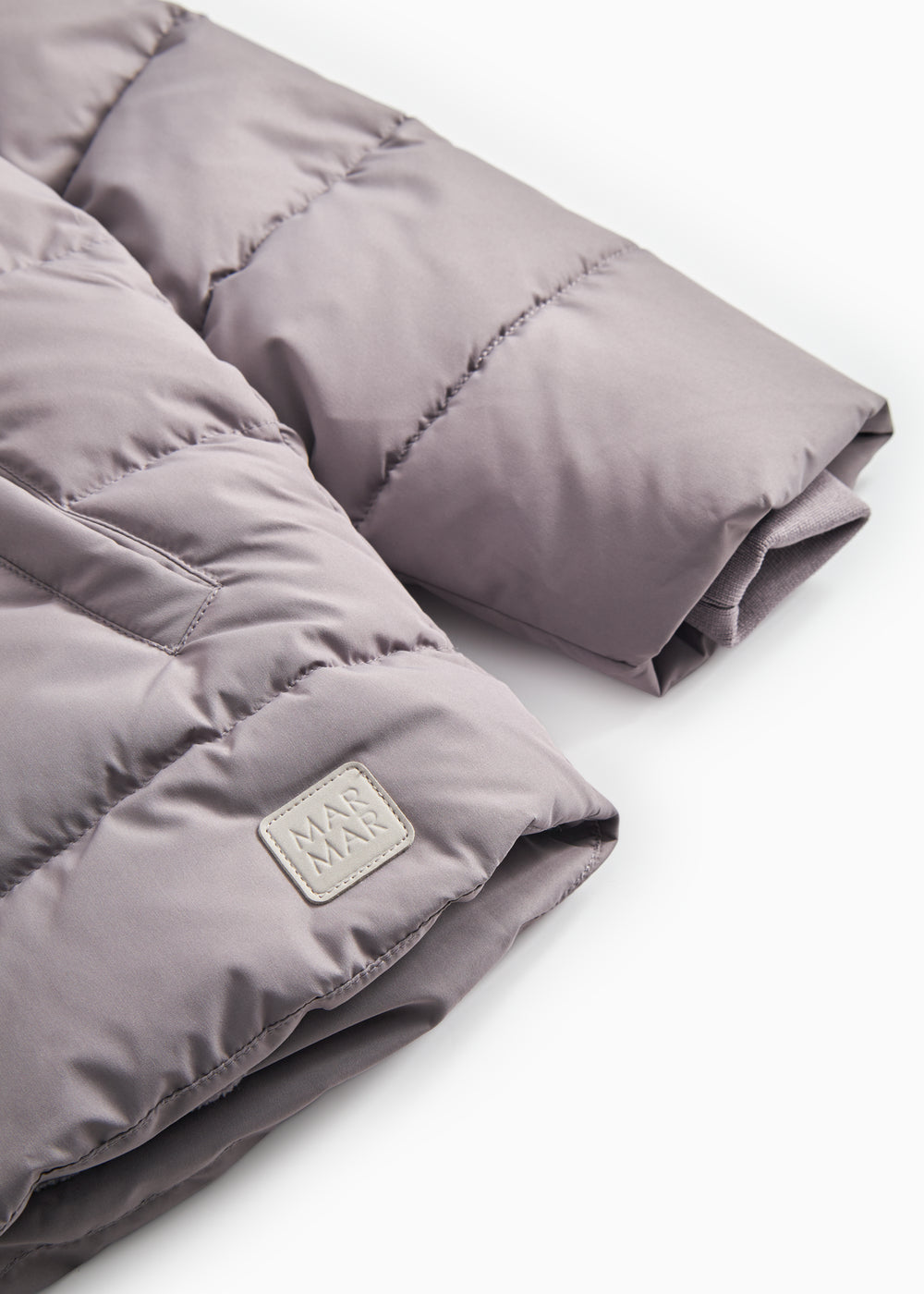 Purple padded jacket with hood and logo branding at the bottom.
