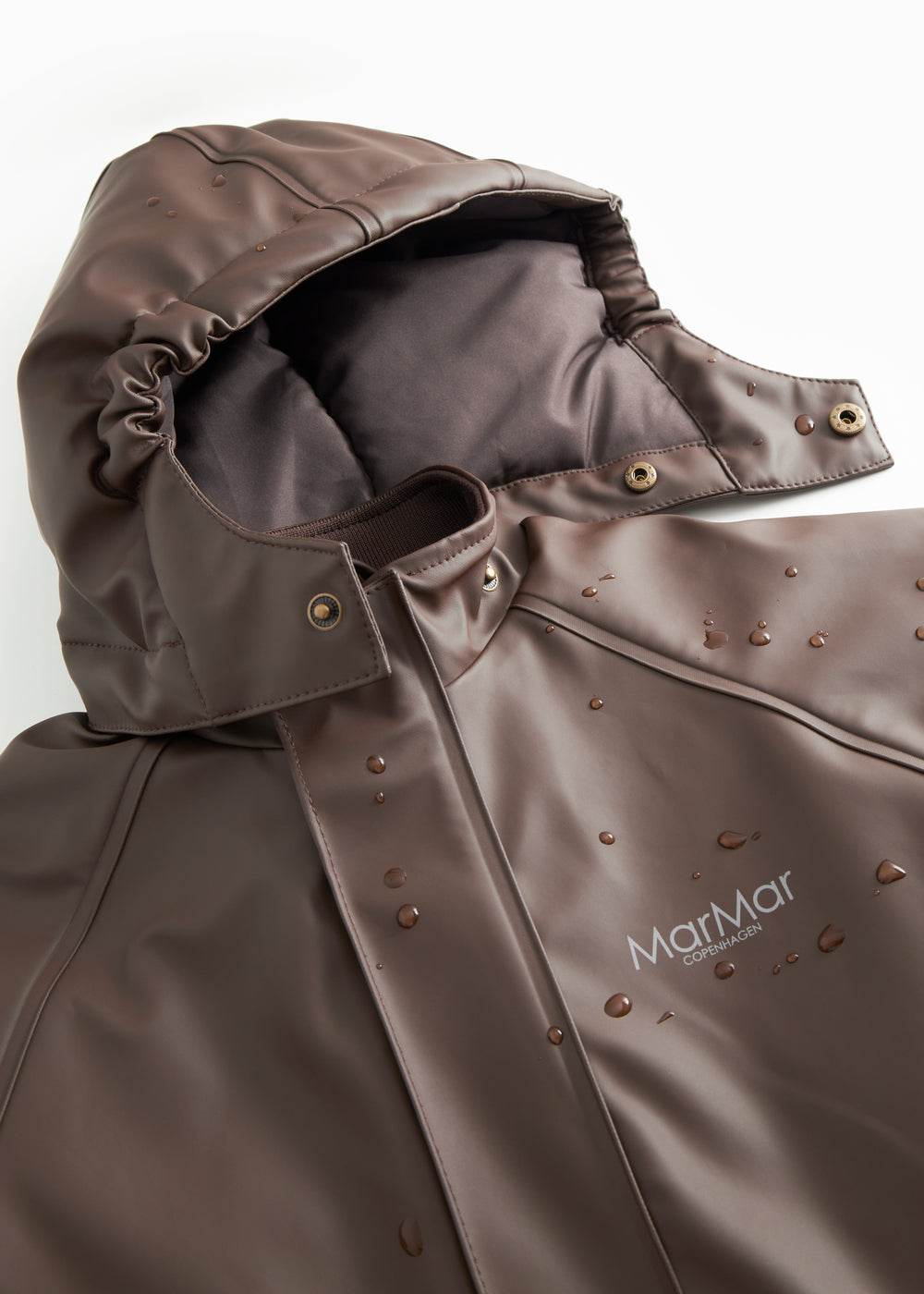PU jumpsuit dark brown: front piece and collar with pressure buttons
