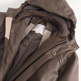 A dark brown flight jacket with a diagonal zipper opening and buttons at the collar.