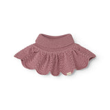 Knitted scarf in muted rose color with crinkled pattern and ribbed edge.
