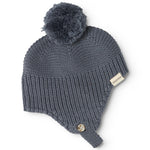 Gray knit cap in knit with pompom, label, and button detail.
