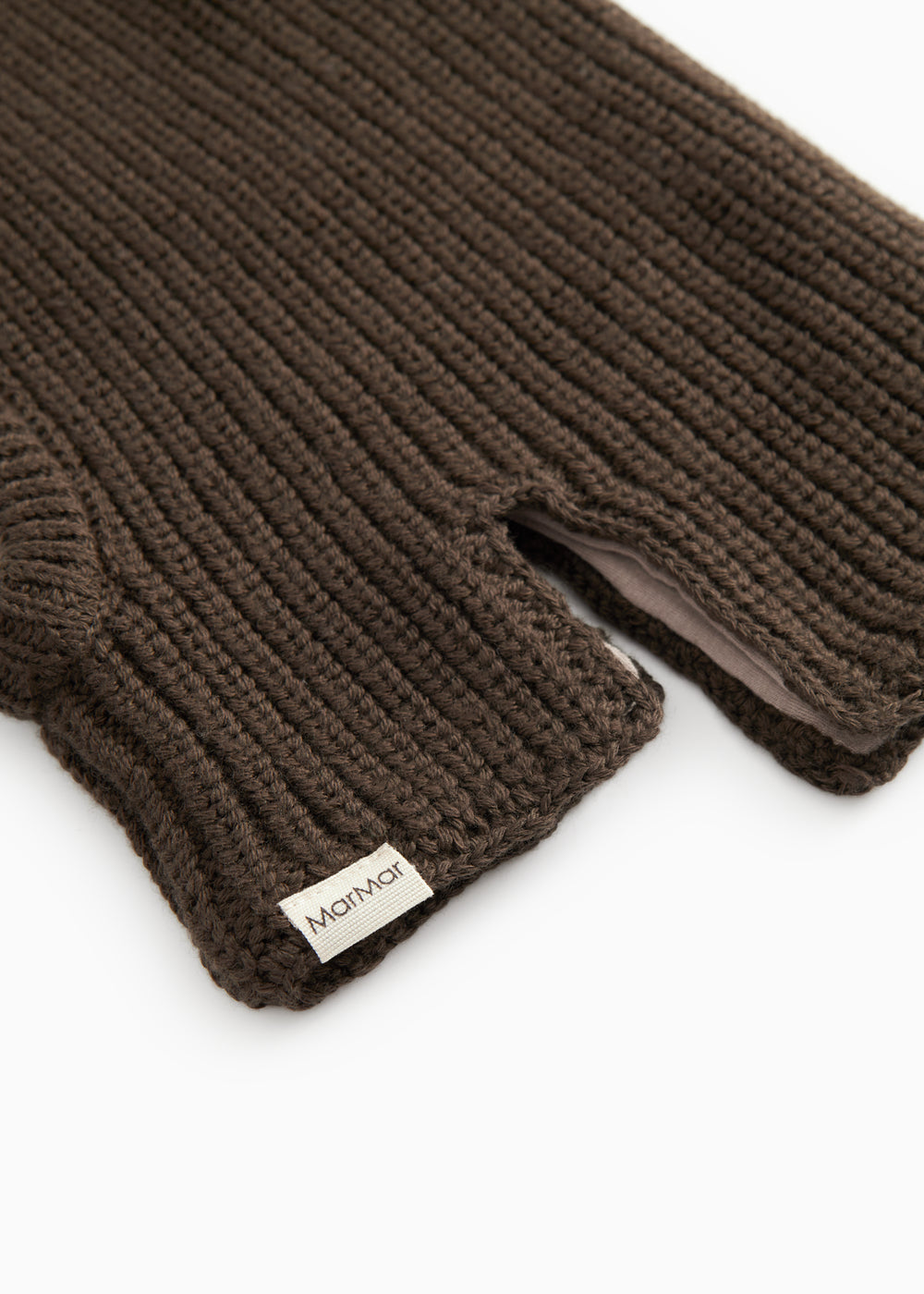 Dark brown striped cap in rib knit with a label at the edge and a hole for the face.