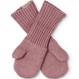 Knitted baby gloves in dusty rose with crossed fingers and ribbed cuff.
