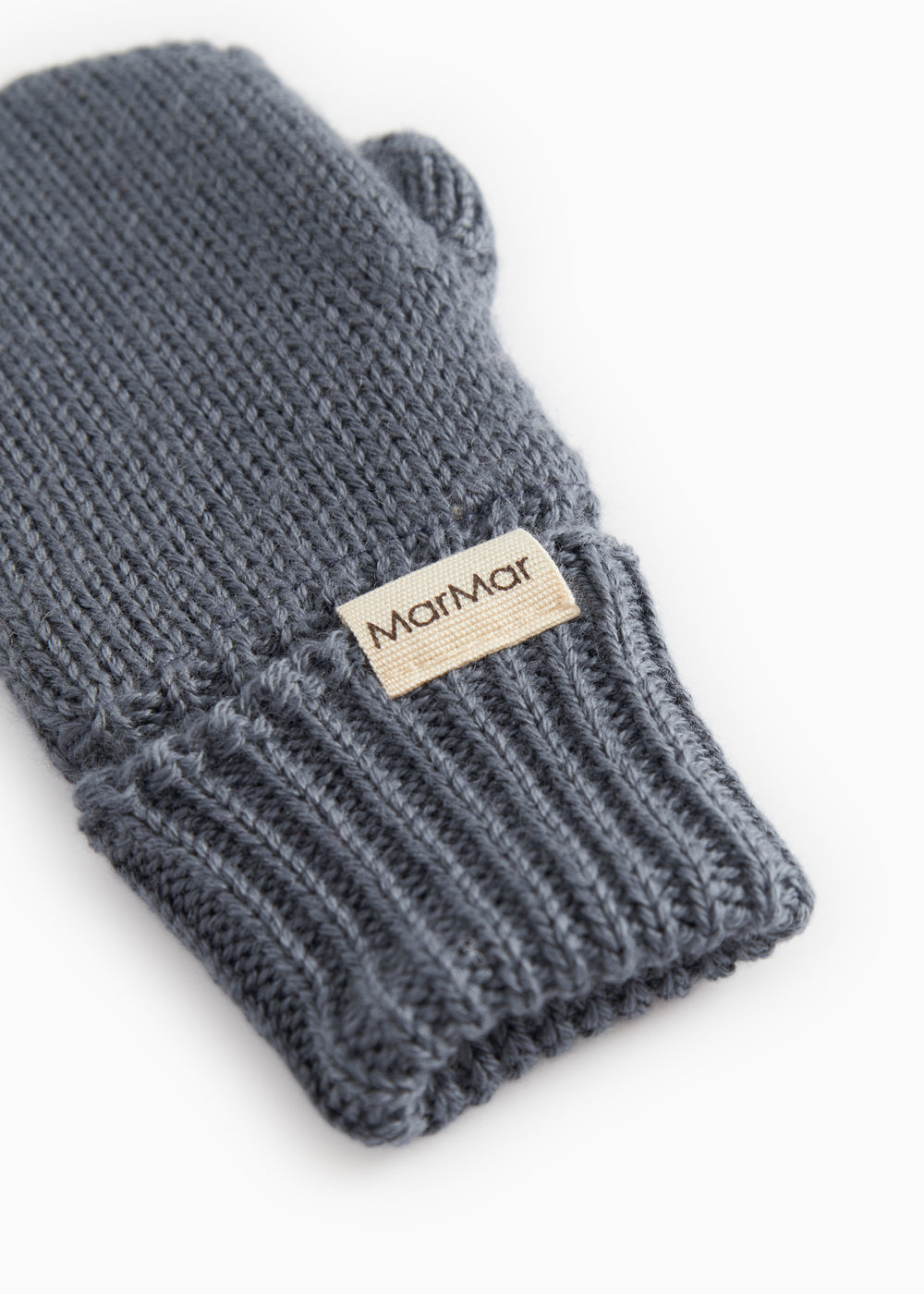 Dark gray woolen knit mittens with ribbing and logo label on the cuff.