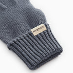 Gray ribbed gloves with ribbed edge and MarMar logo on the cuff.