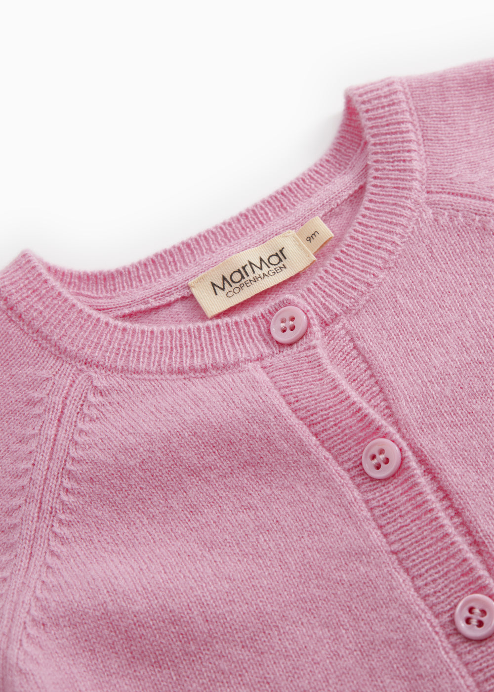 Pink Kashmir cardigan with crew neck, ribbed trim, and buttons