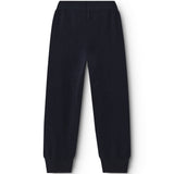 Indigo Kashmir trousers with straight legs and elastic at the ankles.