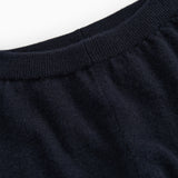 Indigo Kashmir trousers with ribbed elastic lining and smooth surface.