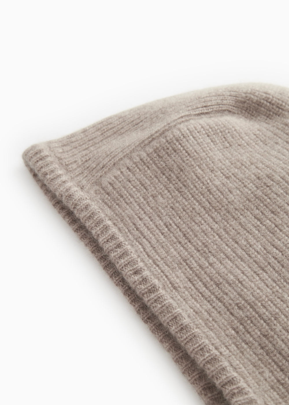 Gray knitted sweater with tight rib pattern and thick knit.