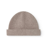 Beige rib-knit alpaca hat with a curved crown and cuff.