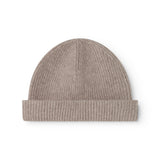 Beige rib-knit alpaca hat with a curved crown and cuff.