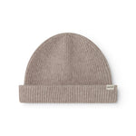 Sand-colored ribbed alpaca hat with cuff and label