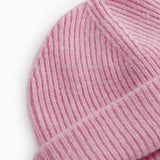 Close-up of pink Kashmir knit hat at the edge and rib knit.