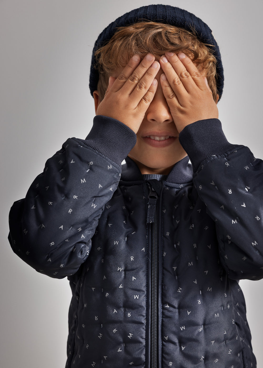 Kids' pajamas in dark blue duvet with hood and full zipper