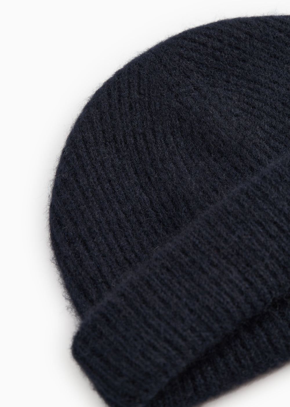 Atlas Kashmir hue in dark indigo with visible knitted rib texture